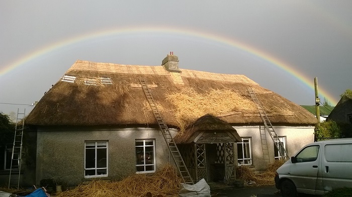 Thatched roof under rainbow, Clonmel, Tipperary