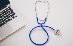 Laptop and Stethoscope - Online Doctor - Telemedicine