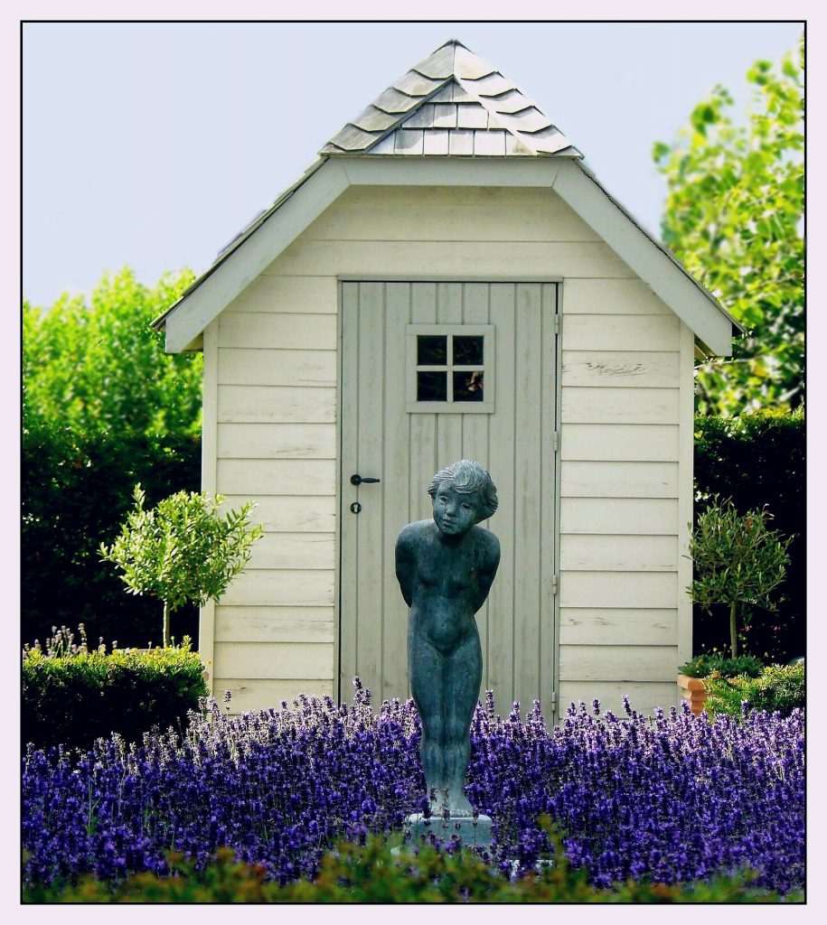 Garden Shed with Lavendar and statue.